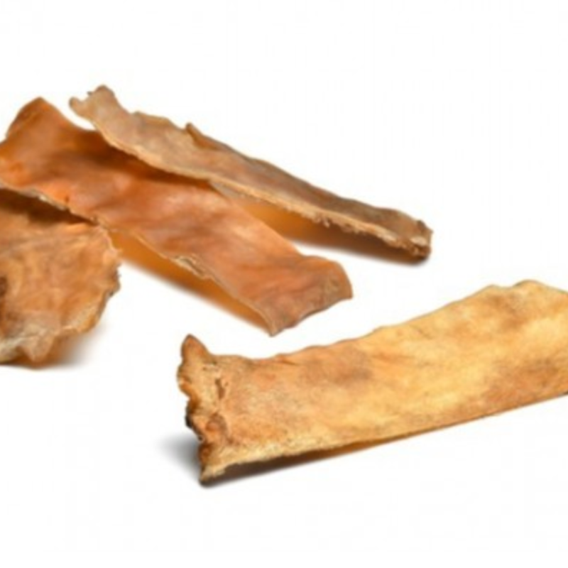 Peaux de boeuf cuites au four et séchées pour chiens